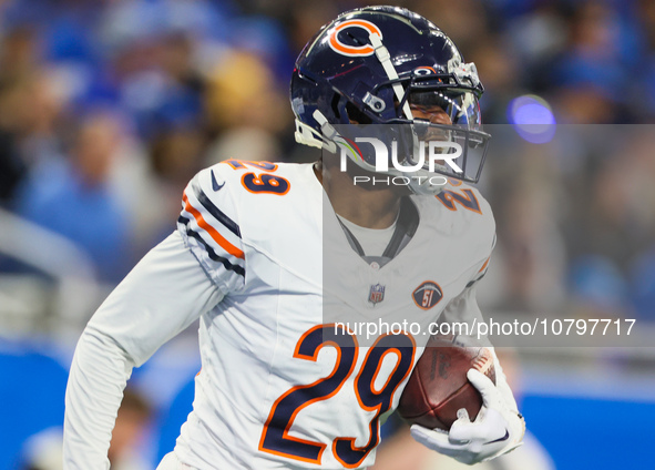 Chicago Bears cornerback Tyrique Stevenson (29) celebrates after intercepting the ball during  an NFL  football game between the Detroit Lio...