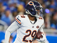 Chicago Bears cornerback Tyrique Stevenson (29) celebrates after intercepting the ball during  an NFL  football game between the Detroit Lio...