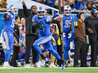 Detroit Lions safety Tracy Walker III (21) carries the ball during  an NFL  football game between the Detroit Lions and the Chicago Bears in...