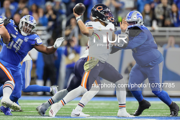 Chicago Bears quarterback Justin Fields (1) looks to pass the ball during  an NFL  football game between the Detroit Lions and the Chicago B...