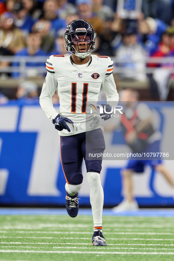 Chicago Bears wide receiver Darnell Mooney (11) runs on the field after a play during  an NFL  football game between the Detroit Lions and t...