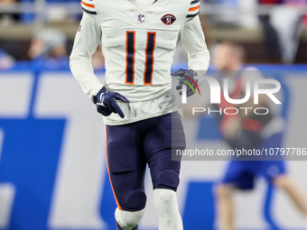 Chicago Bears wide receiver Darnell Mooney (11) runs on the field after a play during  an NFL  football game between the Detroit Lions and t...