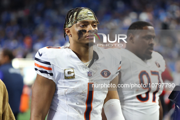 Chicago Bears quarterback Justin Fields (1) walks off the field after the conclusion of an NFL football game between the Chicago Bears and t...