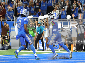 Detroit Lions running back David Montgomery (5) scores a touchdown during the second half of an NFL football game between the Chicago Bears...