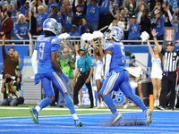 Detroit Lions running back David Montgomery (5) scores a touchdown during the second half of an NFL football game between the Chicago Bears...