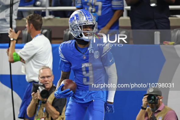 Detroit Lions wide receiver Jameson Williams (9) celebrates his touchdown during the second half of an NFL football game between the Chicago...