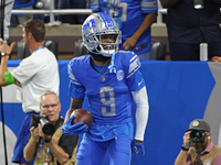 Detroit Lions wide receiver Jameson Williams (9) celebrates his touchdown during the second half of an NFL football game between the Chicago...