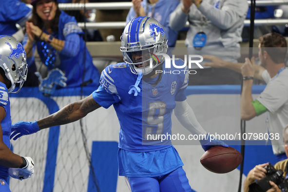 Detroit Lions wide receiver Jameson Williams (9) celebrates his touchdown during the second half of an NFL football game between the Chicago...