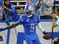 Detroit Lions wide receiver Jameson Williams (9) celebrates his touchdown during the second half of an NFL football game between the Chicago...