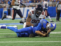 Detroit Lions quarterback Jared Goff (16) is tackled by Chicago Bears defensive end Montez Sweat (98) during the second half of an NFL footb...