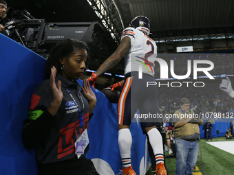 Chicago Bears wide receiver DJ Moore (2) celebrates his touchdown during the second half of an NFL football game between the Chicago Bears a...