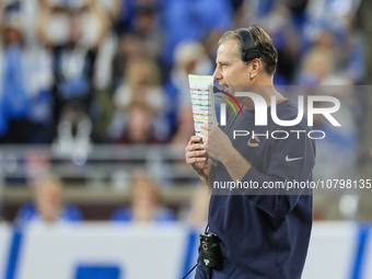 Chicago Bears head coach Matt Eberflus communicates from the sidelines during  an NFL  football game between the Detroit Lions and the Chica...