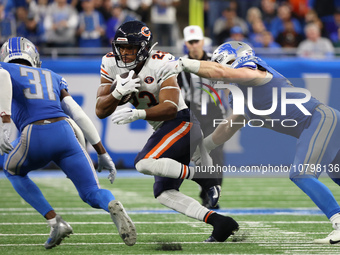 Chicago Bears running back Roschon Johnson (23) runs the ball during the second half of an NFL football game between the Chicago Bears and t...