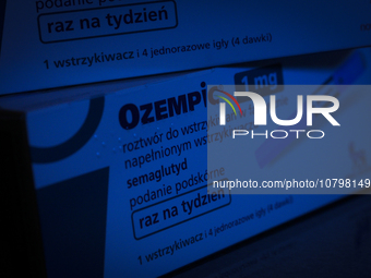 Ozempic weight loss drug packaging is seen in this illustration photo with the Novo Nordisk logo in Warsaw, Poland on 19 November, 2023. Ger...