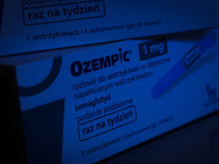 Ozempic weight loss drug packaging is seen in this illustration photo with the Novo Nordisk logo in Warsaw, Poland on 19 November, 2023. Ger...