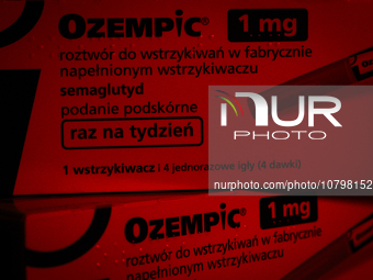 Ozempic weight loss drug packaging is seen in this illustration photo with the Novo Nordisk logo in Warsaw, Poland on 19 November, 2023. Ger...