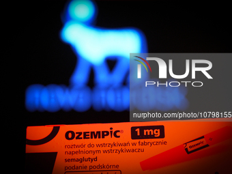 Ozempic weight loss drug packaging is seen in this illustration photo with the Novo Nordisk logo in Warsaw, Poland on 19 November, 2023. Ger...