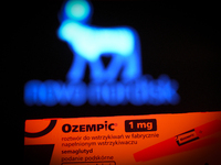 Ozempic weight loss drug packaging is seen in this illustration photo with the Novo Nordisk logo in Warsaw, Poland on 19 November, 2023. Ger...