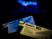 Ozempic weight loss drug packaging is seen in this illustration photo with the Novo Nordisk logo in Warsaw, Poland on 19 November, 2023. Ger...