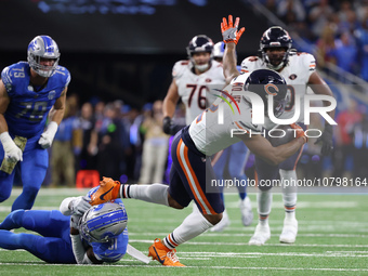 Chicago Bears wide receiver DJ Moore (2) runs the ball against Detroit Lions safety Kerby Joseph (31) during the first half of an NFL footba...