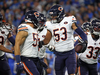 Chicago Bears linebacker T.J. Edwards (53) celebrates after an interception during the first half of an NFL football game between the Chicag...