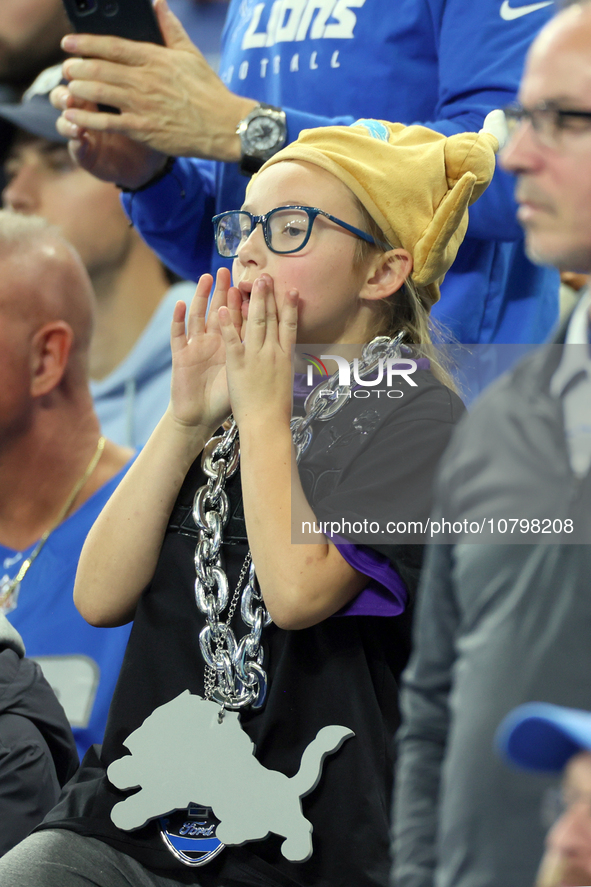 A fan wearing a turkey hat cheers from the stands during  an NFL  football game between the Detroit Lions and the Chicago Bears in Detroit,...