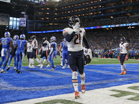 Chicago Bears running back D'Onta Foreman (21) scores a touchdown during the first half of an NFL football game between the Chicago Bears an...