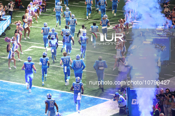 Detroit Lions players head to the field from the tunnel during an NFL football game between the Chicago Bears and the Detroit Lions in Detro...