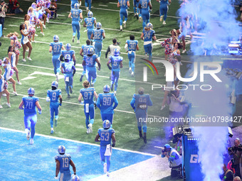 Detroit Lions players head to the field from the tunnel during an NFL football game between the Chicago Bears and the Detroit Lions in Detro...