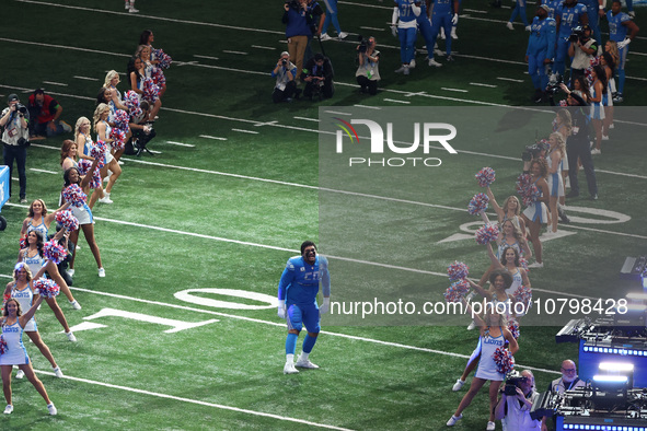 Detroit Lions offensive tackle Penei Sewell (58) heads to the field from the tunnel during an NFL football game between the Chicago Bears an...