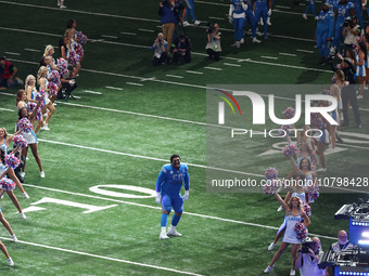 Detroit Lions offensive tackle Penei Sewell (58) heads to the field from the tunnel during an NFL football game between the Chicago Bears an...