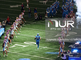 Detroit Lions guard Graham Glasgow (60) heads to the field from the tunnel during an NFL football game between the Chicago Bears and the Det...