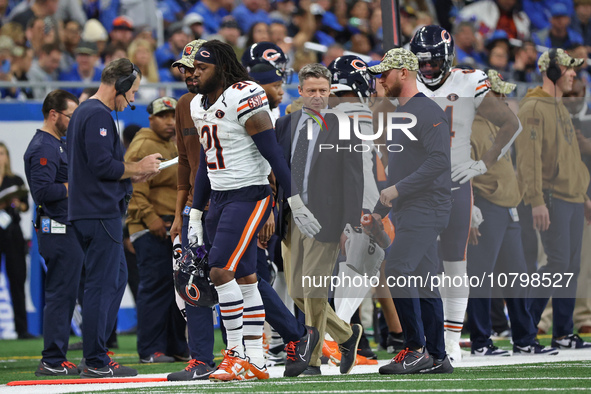 Chicago Bears running back D'Onta Foreman (21) is taken off the field after an ankle injury during the second half of an NFL football game b...