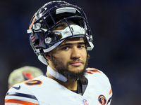 Chicago Bears running back Travis Homer (20) looks down the field ahead of an NFL  football game between the Detroit Lions and the Chicago B...