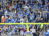 Fans behind the goal post in the end zone hold up signs for a third down during  an NFL  football game between the Detroit Lions and the Chi...