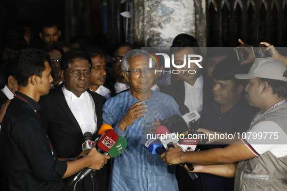 Nobel Peace Prize laureate and Grameen Telecom chairman Professor Muhammad Yunus speaks to journalists in front of a labor court in Dhaka, B...