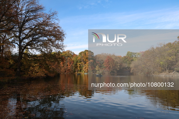 People enjoy a boat ride on The Lake in Central Park while enjoying the fall weather in New York City, New York , Wednesday, Nov. 8, 2023.  