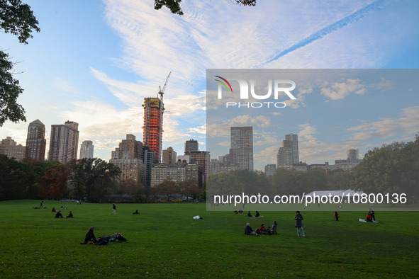 People enjoy a fall day in the Sheep Meadow in Central Park while enjoying the fall weather in New York City, New York , Monday, Nov. 6, 202...