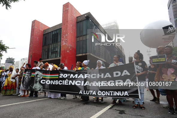 Protesters participate in a march to mark the celebrations for the 20th anniversary of the establishment of Black Consciousness Day, on Aven...