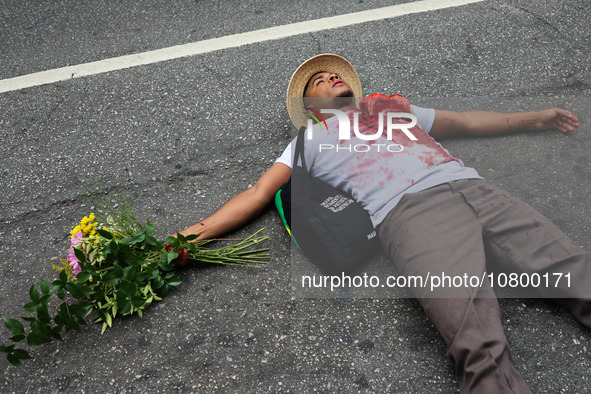 Protesters participate in a march to mark the celebrations for the 20th anniversary of the establishment of Black Consciousness Day, on Aven...