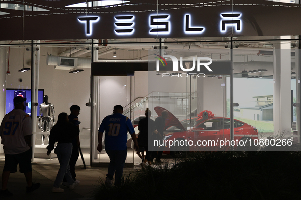 Tesla logo is seen at the showroom in Santa Monica, United States on November 12, 2023. 