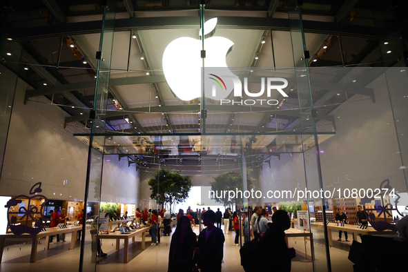 People are seen at Apple Store in Santa Monica, United States on November 12, 2023. 