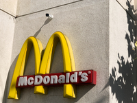 McDonald's logo is seen near the restaurant in Santa Monica, United States on November 13, 2023. (