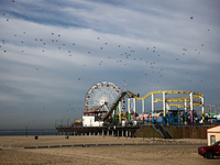 A view of the Pacific Park on the Santa Monica Pier and the beach in Santa Monica, United States on November 13, 2023. (