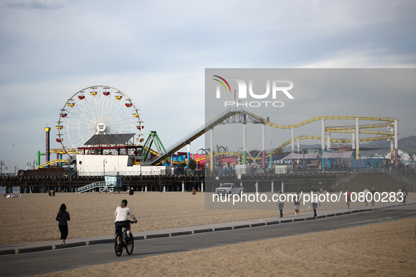 A view of the Pacific Park on the Santa Monica Pier and the beach in Santa Monica, United States on November 13, 2023. 