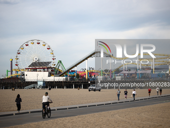 A view of the Pacific Park on the Santa Monica Pier and the beach in Santa Monica, United States on November 13, 2023. (