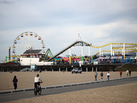 A view of the Pacific Park on the Santa Monica Pier and the beach in Santa Monica, United States on November 13, 2023. (