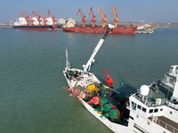 YANTAI, CHINA - NOVEMBER 21, 2023 - The ''Haixun 153'' navigation vessel releases a new beacon into the sea at the main channel of Longkou P...