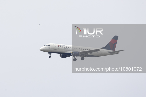 Delta Connection Embraer ERJ-175 passenger airplane operated by Republic Airlines spotted flying over Washington DC before landing at Ronald...