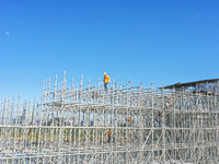 Workers are working at the construction site of the Xuancheng-Hangzhou Railway interchange in Huzhou, China, on November 22, 2023. (